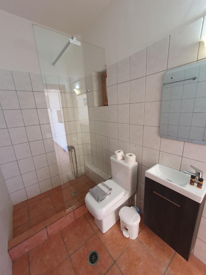 Stoupa Mani Tower Apartment Bagian luar foto